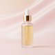 Huile capillaire - fond rose